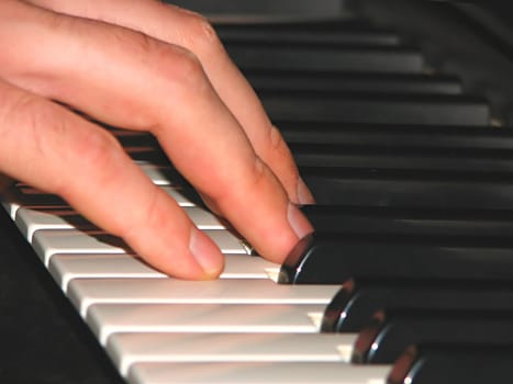 Finger play on the keys of a keyboard