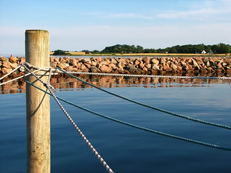 In the full harbor,the stern pile is occupied by several ships.  Like here in the harbour of Avernakø,a very small island in the Danish South Seas.