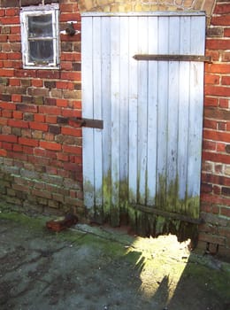 This is a door to a shed. The building is over 100 years old - so are the doors and windows.
