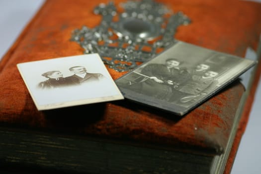 Old photo album with photos from the flea market