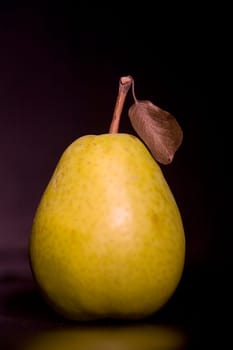 Pear in front of a black background