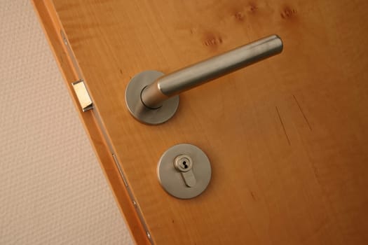 Simple room door with metal handle