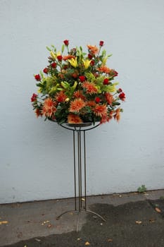 Flower arrangement red with various flowers