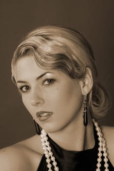 Portrait photo of a woman dressed in the style of the 20s with her mouth open