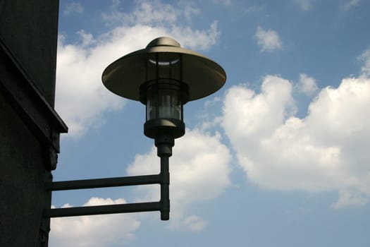 Lantern silhouette in front of summer sky
