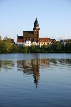 View over the Tiefwarensee to the old town of Warenr with the church of St. Mary