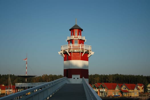 Here we took a look at the emerging harbour village of Rheinsberg,near Berlin,in autumn. It is a huge (but beautifully designed) holiday complex with many small houses,which can be rented or bought with their own jetty.