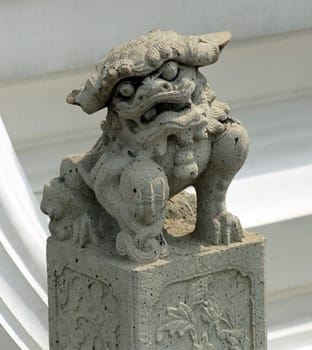 Chinese guardian figure made of stone in the shape of a lion