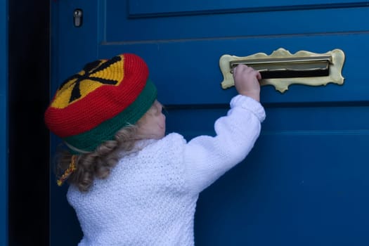Child at letter slot Germany