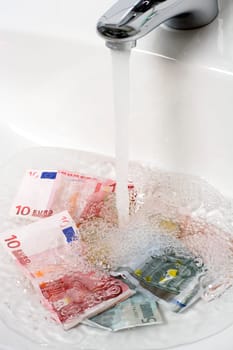 Money laundering Money is laundered under running water
