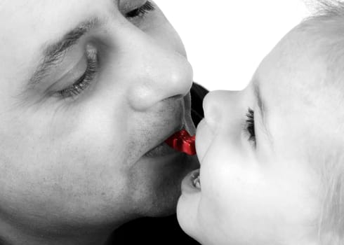 Father and child with gummy bear