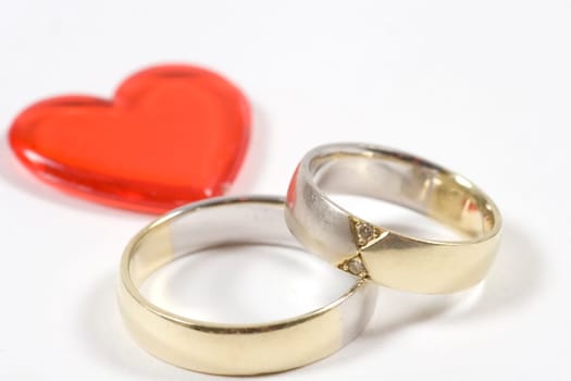 Two wedding rings and a heart