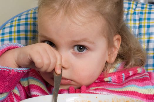 Child takes a short break while eating