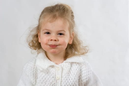 Girl makes chubby cheeks