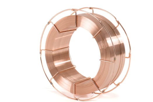 Welding wire wound on a roll,insulated against a white background