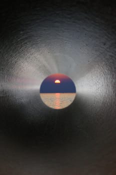 Here you can "look into the tube""!  Since the view at the end of this tube was so dreary,I put in a pretty sunset ..."