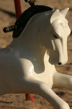 Carousel horse on a children's playground