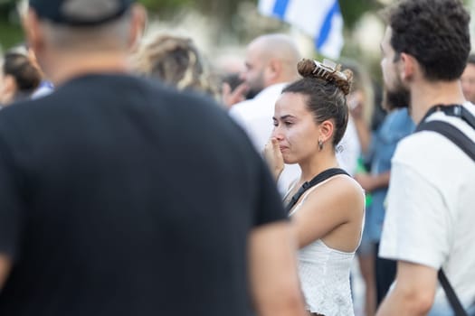 Lisbon, Portugal, October 10, 2023, A woman cries at a rally in support of Israel. Mid. shot