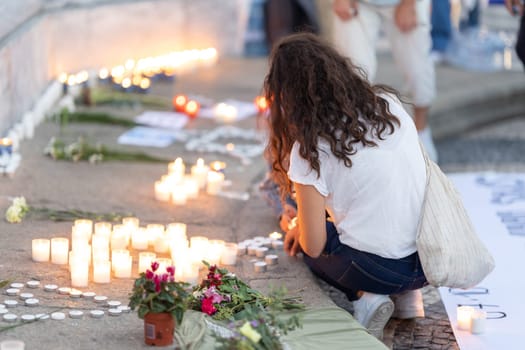 Lisbon, Portugal October 10, 2023. A woman at the memorial to the fallen Israelis in October 2023. Mid. shot