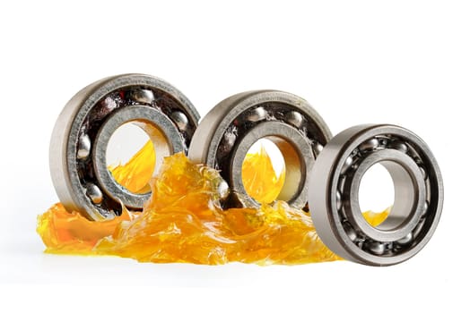 Grease and ball bearing  isolated on white background with clipping path, lithium machinery lubrication for automotive and industrial.