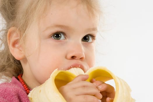 Child eating a banana