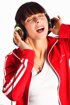 A woman with headphones singing