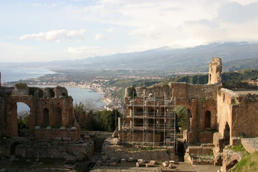 Goethe called the Teatro Greco "the most beautiful theatre in the world"". Here,unfortunately,Mount Etna is hidden in the haze in the background."