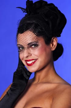 Photo shows a woman,laughing,in the style of the 20s.