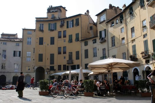 Piazzo Anfiteatro in Lucca in the afternoon.