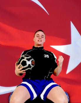 Jubilation in front of the Turkish flag