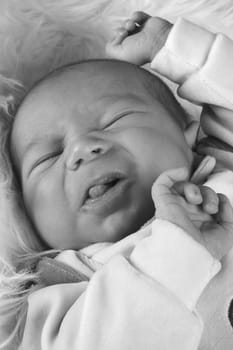 Baby with tongue sticking out