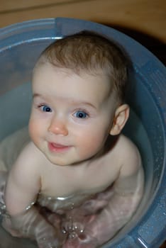 One-year-old child in the bath.