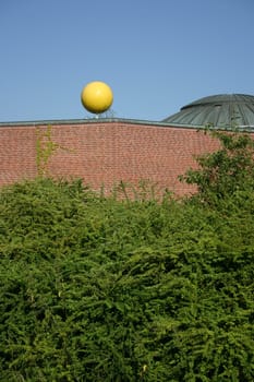 Dome of the planetarium in the Natural History Museum Münster. The yellow sphere represents the sun and is also the end point of the so-called planetary path.