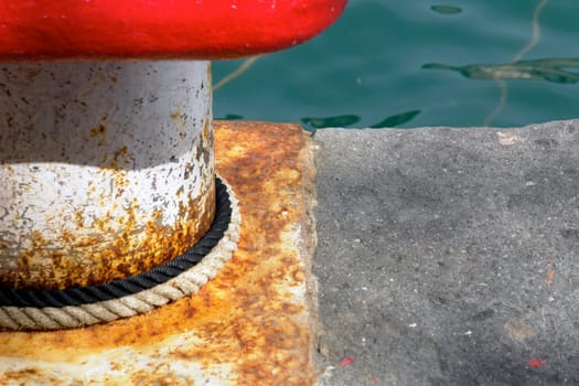 Red bollard in the harbour