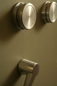 Door of a safe with adjusting washers for the combination lock