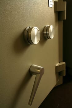Door of a safe with adjusting washers for the combination lock