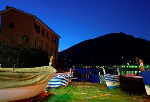 Due to the different light sources,a colorful play of colors is created in front of the night evening sky.