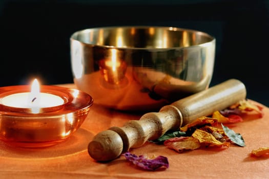 Singing bowl and candle