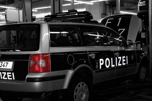 Police car in the workshop