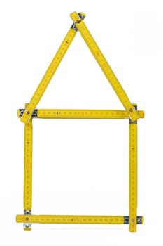 A folding rule shaped as a house