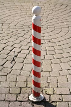 Red and white ringed pillar