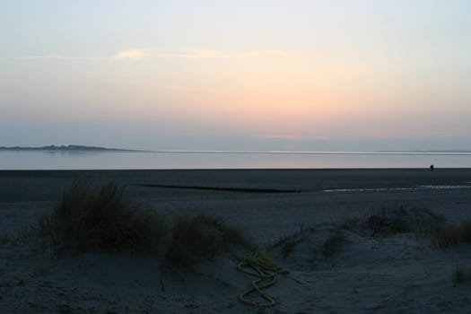 In the evening at low tide on the beach on the island of Föhr.