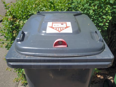 you rarely see a garbage can with a lock :-)