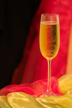 Sparkling wine in black-red-gold