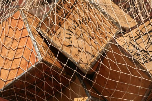 Tea boxes in a fishing net