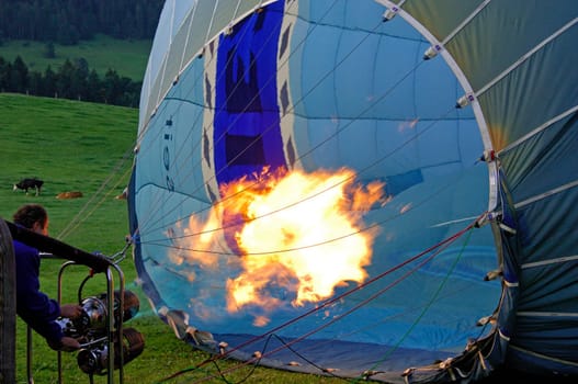 Preparing a hot air balloon for take-off