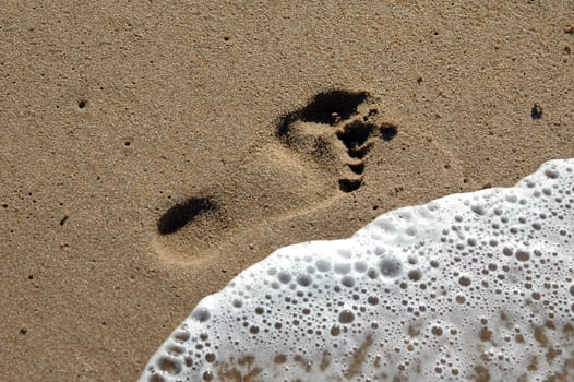 Footprint by the sea