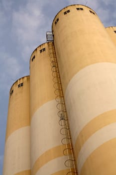 Very tall grain silos of a food factory