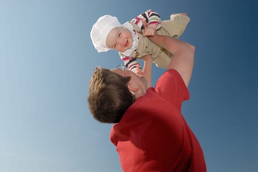 Mother with laughing child in her arms