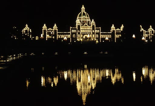 The parliament building of the capital of British Columbia (Canada) in Victoria on Vancouver Island is brightly lit every night with thousands of light bulbs. ---- scan of the slide---
